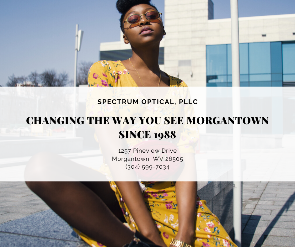 A woman wears sunglasses behind a graphic that says "Spectrum Optical, PLLC: Changing the Way You See Morgantown Since 1988."