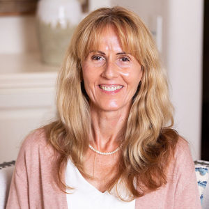 A woman smiling